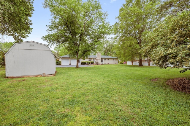 110 Ewingville Dr, Franklin, TN 37064 - view of grassy yard with a detached garage