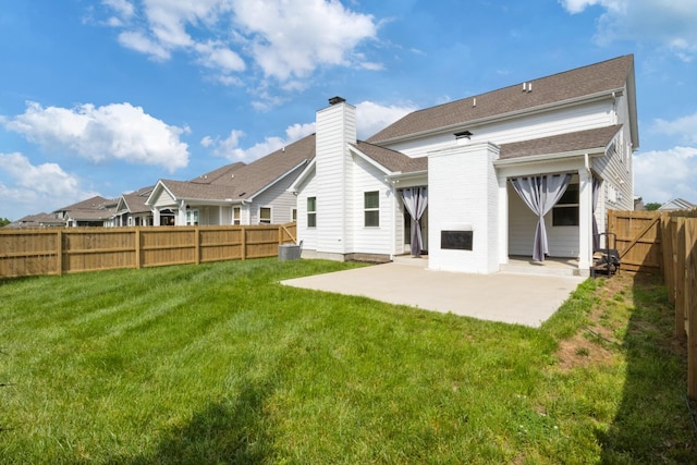3515 Anthony Ave, Murfreesboro, TN 37129 - back of house featuring cooling unit, a fenced backyard, a chimney, a patio area, and a yard