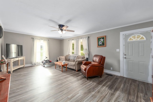 96 Concord Cades Rd, Milan, TN 38358 - living area with wood finished floors, ornamental molding, baseboards, and ceiling fan