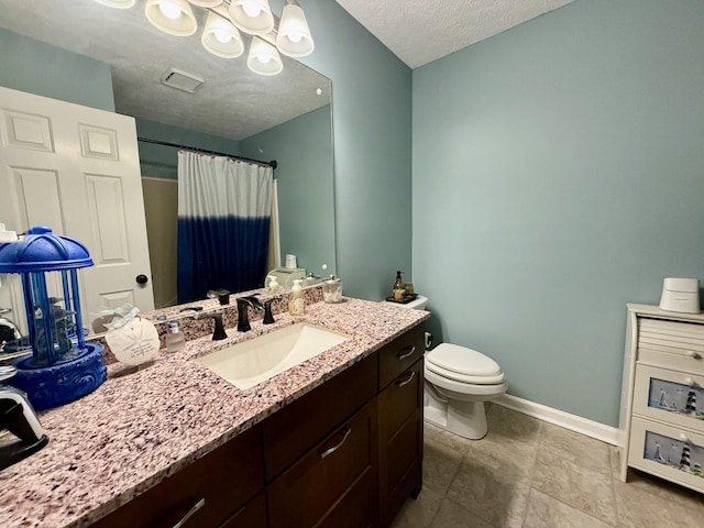 full bathroom featuring a textured ceiling, vanity, baseboards, toilet, and visible vents