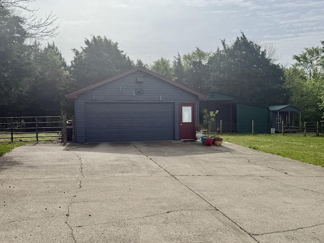 detached garage with fence