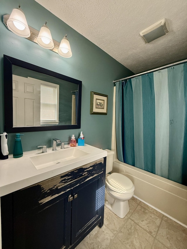 bathroom with a textured ceiling, toilet, visible vents, shower / tub combo, and vanity