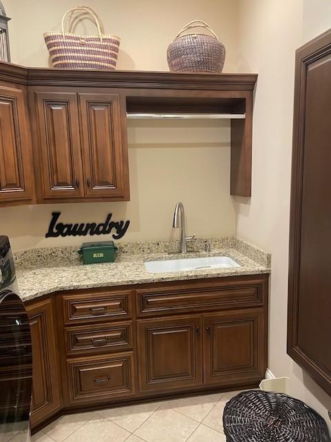 889 Plantation Blvd, Gallatin, TN 37066 - interior space featuring light tile patterned floors and a sink