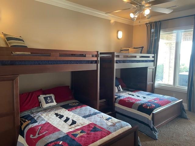 889 Plantation Blvd, Gallatin, TN 37066 - bedroom with crown molding, ceiling fan, carpet flooring, and multiple windows