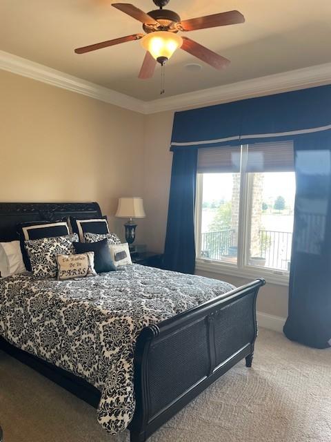 889 Plantation Blvd, Gallatin, TN 37066 - carpeted bedroom with ceiling fan, baseboards, and ornamental molding
