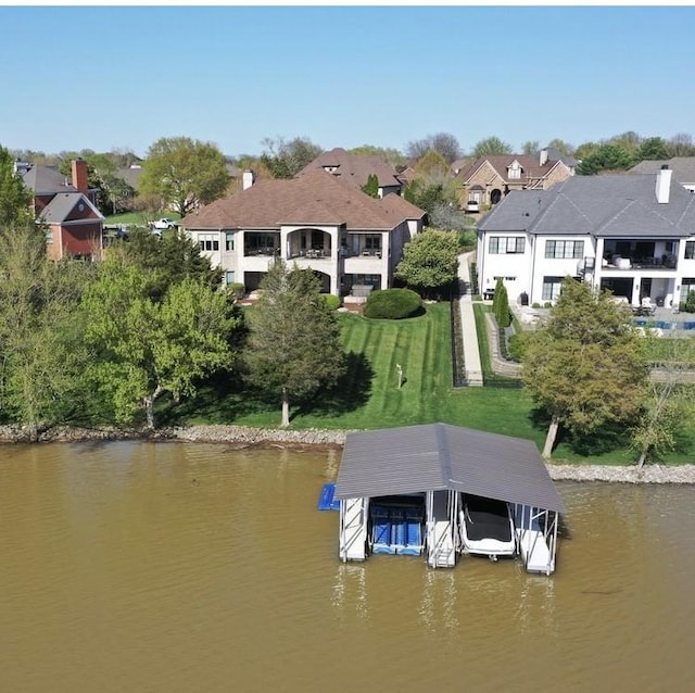 889 Plantation Blvd, Gallatin, TN 37066 - view of dock with a residential view, a lawn, a water view, and boat lift
