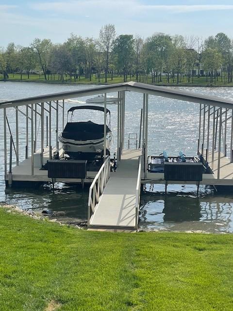 889 Plantation Blvd, Gallatin, TN 37066 - view of dock featuring a lawn, a water view, and boat lift