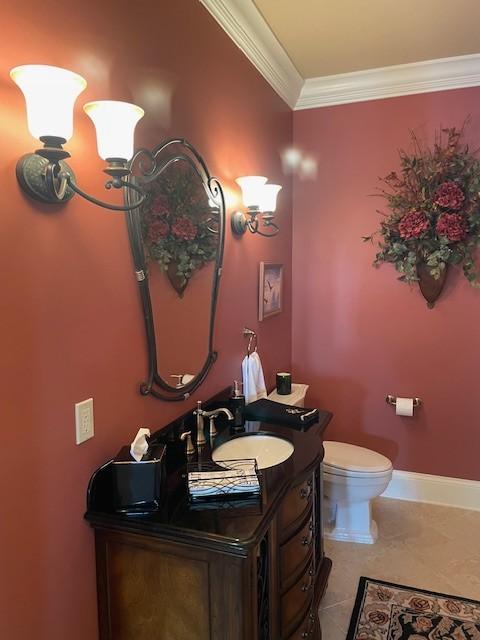 889 Plantation Blvd, Gallatin, TN 37066 - half bath with toilet, crown molding, vanity, and baseboards