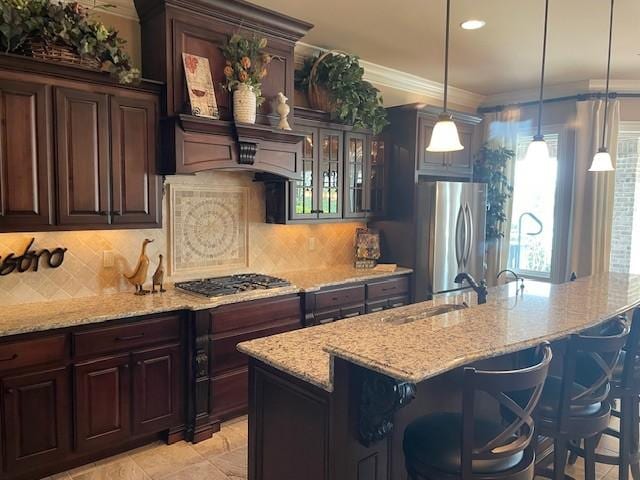 889 Plantation Blvd, Gallatin, TN 37066 - kitchen with a kitchen bar, tasteful backsplash, stainless steel appliances, and a sink