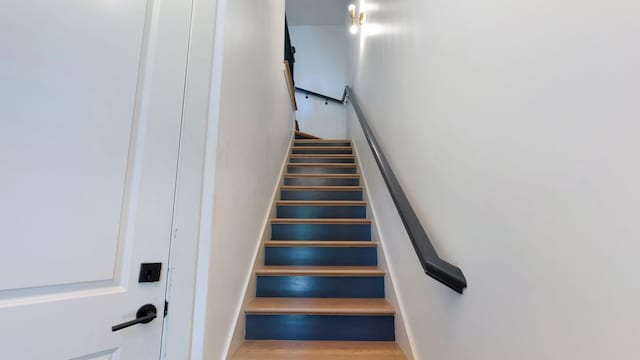 stairway with a high ceiling