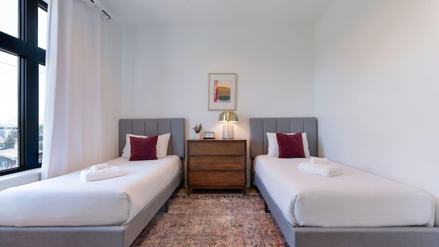 bedroom featuring multiple windows