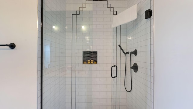 full bathroom with a shower stall