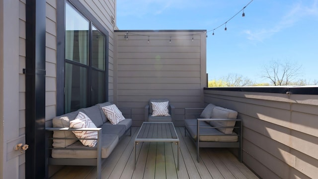 balcony with an outdoor hangout area