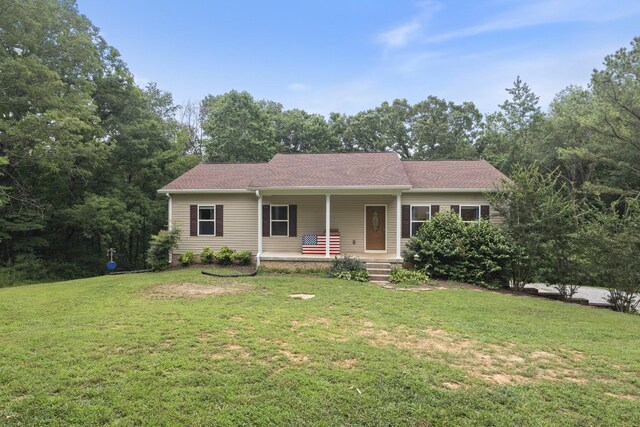 6336 Hickory Dr, Centerville, TN 37033 - ranch-style home with a porch and a front yard