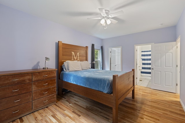 6336 Hickory Dr, Centerville, TN 37033 - bedroom featuring light wood-style flooring, ensuite bathroom, and a ceiling fan