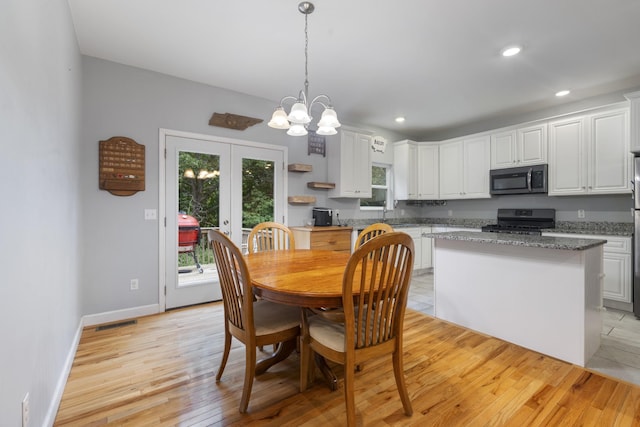 6336 Hickory Dr, Centerville, TN 37033 - dining area with light wood-style flooring, french doors, recessed lighting, and a chandelier