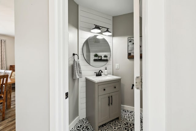 bathroom with vanity and baseboards
