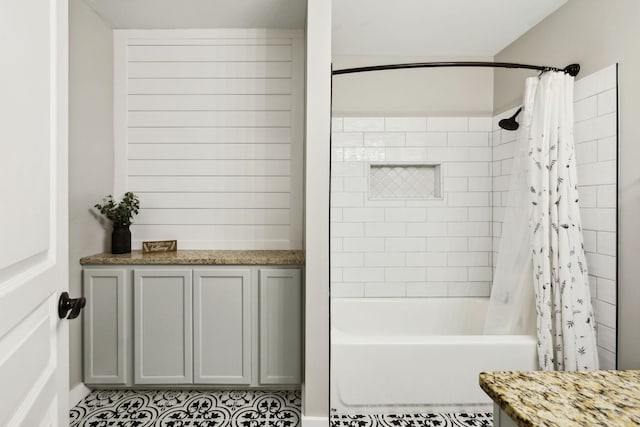 full bathroom with tile patterned flooring and shower / bathtub combination with curtain