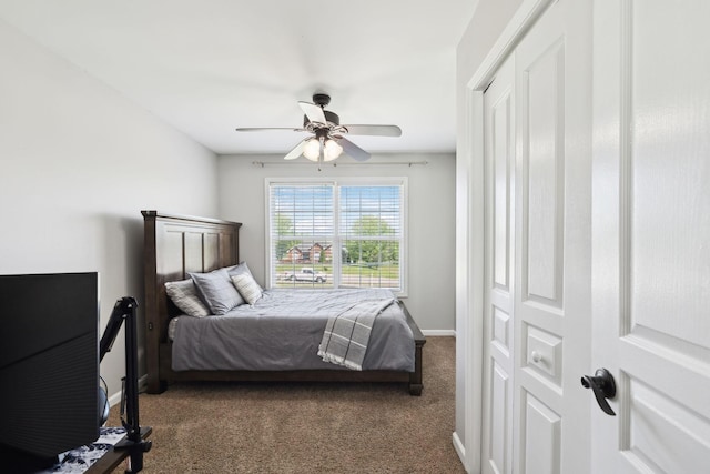 bedroom with baseboards, a ceiling fan, and carpet flooring