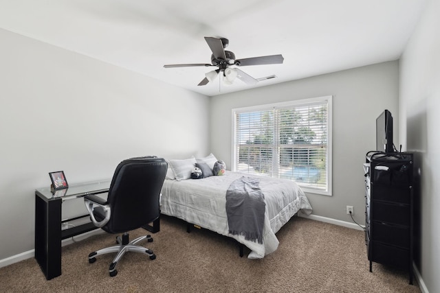bedroom featuring baseboards, a ceiling fan, carpet, and visible vents