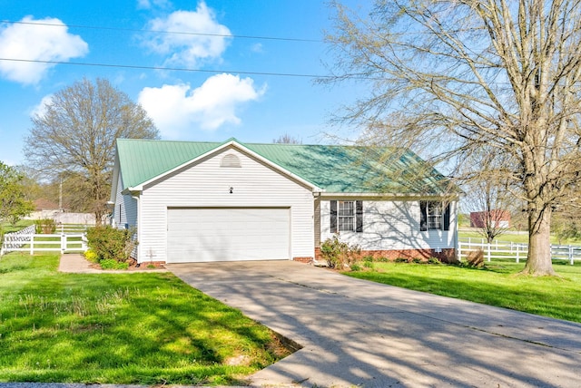 single story home with fence, concrete driveway, a front lawn, and a garage