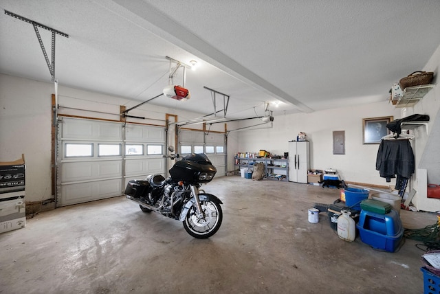 2413 Tana Way, Clarksville, TN 37042 - garage featuring a garage door opener and electric panel