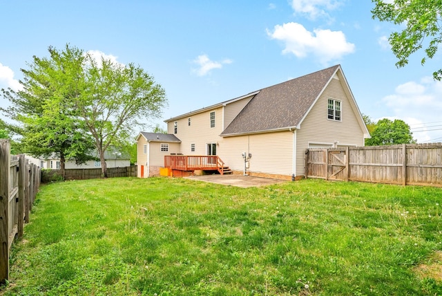 2413 Tana Way, Clarksville, TN 37042 - back of house featuring a fenced backyard, a deck, and a lawn