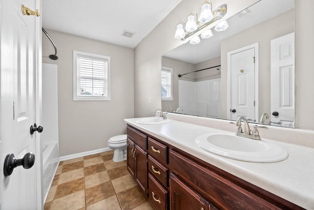 2413 Tana Way, Clarksville, TN 37042 - full bathroom with visible vents, a sink, double vanity, and toilet