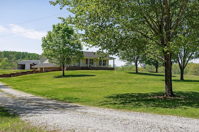 view of front facade with a front yard