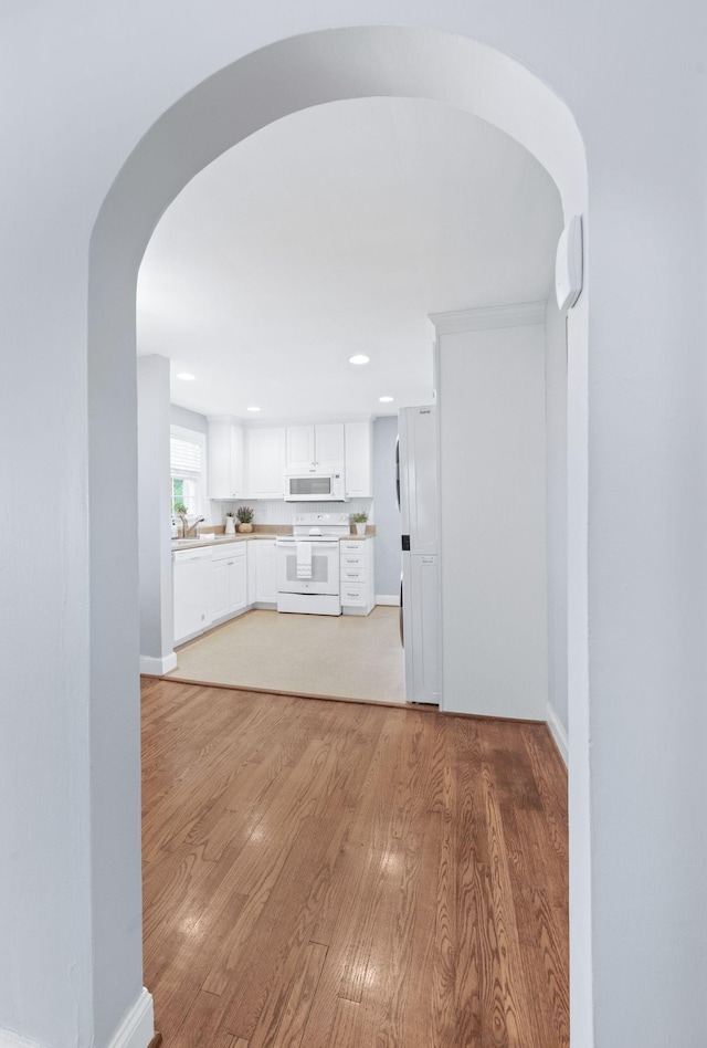 120 39th Ave N, Nashville, TN 37209 - interior space with recessed lighting, baseboards, arched walkways, and light wood-style flooring