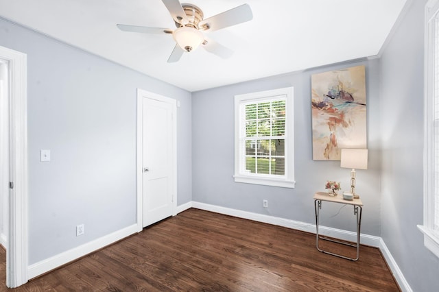 120 39th Ave N, Nashville, TN 37209 - unfurnished bedroom featuring baseboards, ceiling fan, and dark wood-style floors