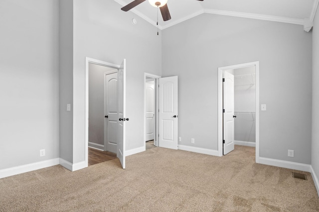 159 Matheson Dr, Clarksville, TN 37043 - unfurnished bedroom with visible vents, ornamental molding, carpet floors, baseboards, and high vaulted ceiling