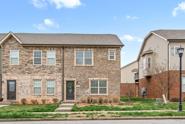 159 Matheson Dr, Clarksville, TN 37043 - view of front of house with a shingled roof and brick siding