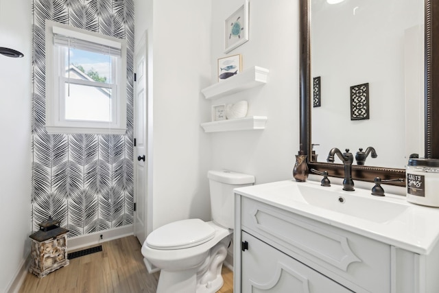 full bath featuring vanity, toilet, baseboards, wood finished floors, and a shower with curtain