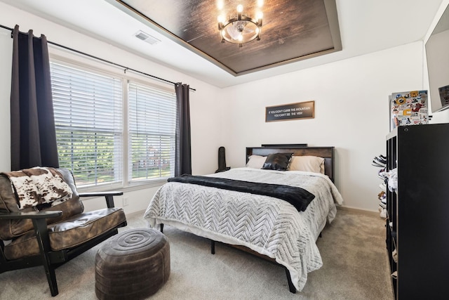 bedroom with baseboards, carpet, and visible vents