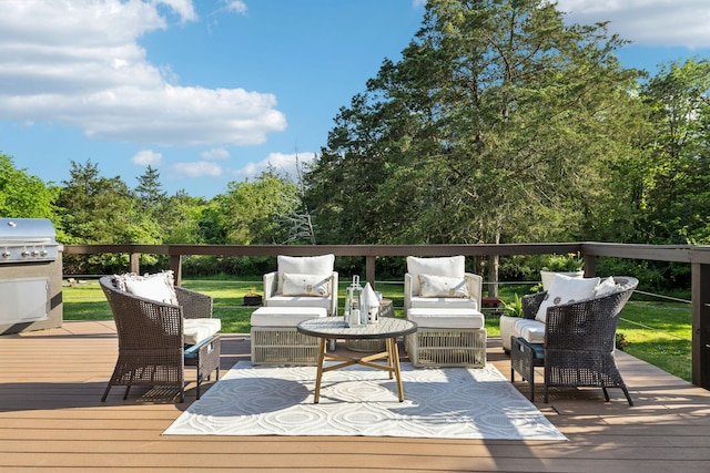 wooden terrace with outdoor lounge area