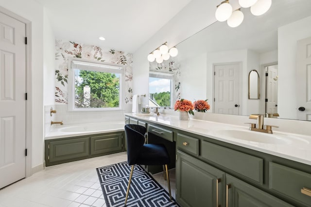 bathroom with a garden tub, a sink, tile patterned floors, and double vanity