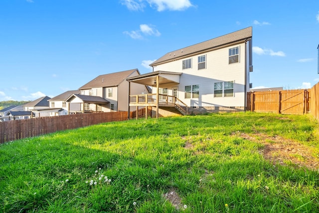 back of house featuring crawl space and a fenced backyard