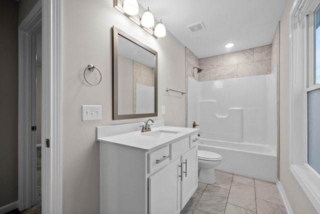 full bath featuring toilet, visible vents, marble finish floor, vanity, and shower / tub combination