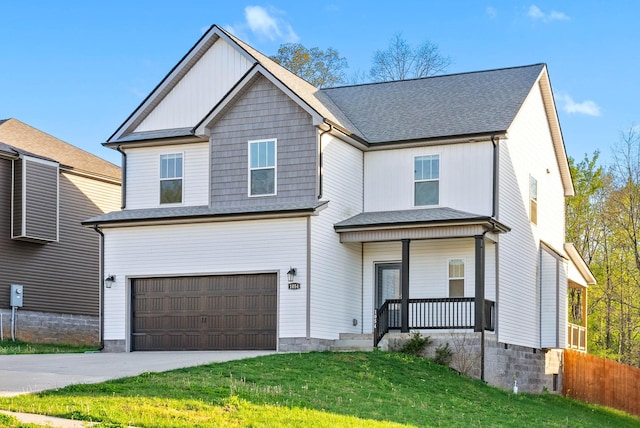 view of front of house featuring driveway, a shingled roof, an attached garage, a porch, and a front yard