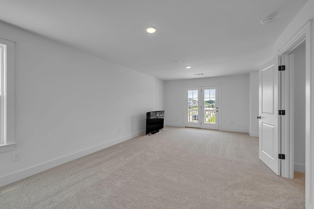 698 Conifer Dr, Spring Hill, TN 37174 - unfurnished room featuring light carpet, recessed lighting, baseboards, and a smoke detector