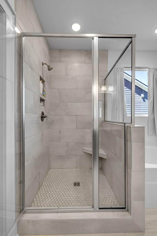 698 Conifer Dr, Spring Hill, TN 37174 - bathroom featuring a shower stall and a tub