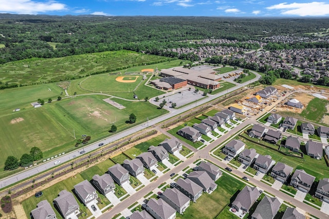 698 Conifer Dr, Spring Hill, TN 37174 - aerial view of property and surrounding area with a forest and nearby suburban area