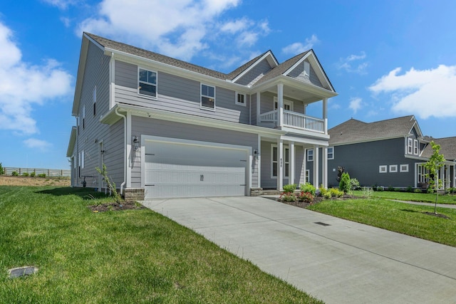 698 Conifer Dr, Spring Hill, TN 37174 - view of front of home with driveway, a front yard, an attached garage, and a balcony