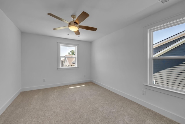 698 Conifer Dr, Spring Hill, TN 37174 - unfurnished room with carpet, baseboards, and a ceiling fan