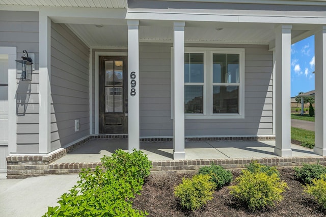 698 Conifer Dr, Spring Hill, TN 37174 - entrance to property featuring a porch