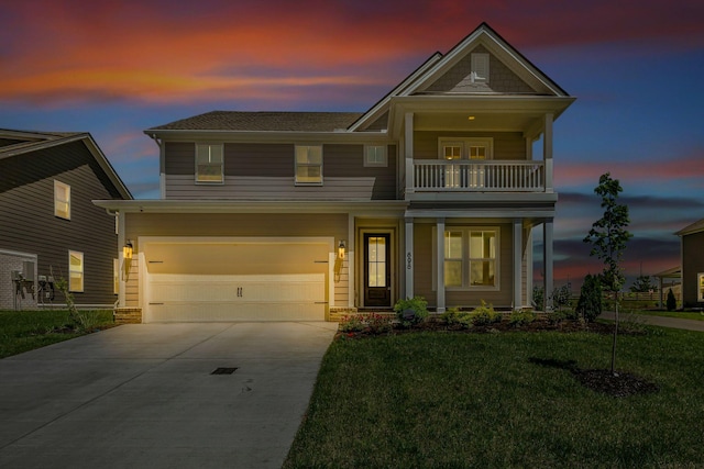 698 Conifer Dr, Spring Hill, TN 37174 - view of front of home with a balcony, concrete driveway, a front lawn, covered porch, and an attached garage