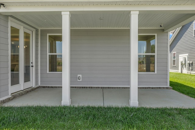 698 Conifer Dr, Spring Hill, TN 37174 - covered porch featuring a lawn