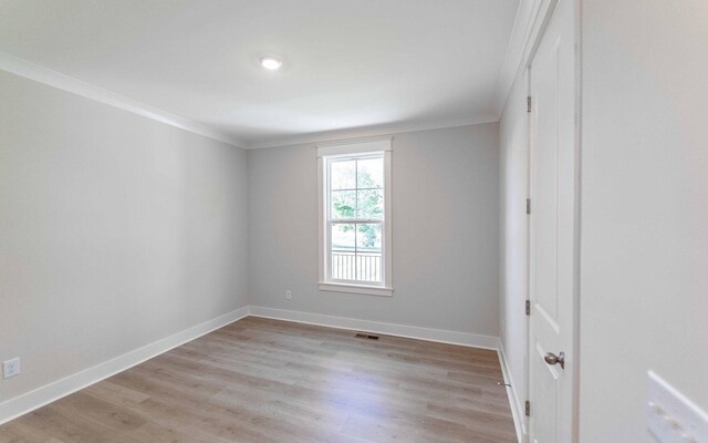 7295 NW Hwy, Fairview, TN 37062 - unfurnished room featuring ornamental molding, light wood-style flooring, and baseboards