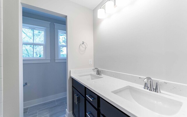 7295 NW Hwy, Fairview, TN 37062 - bathroom featuring double vanity and baseboards